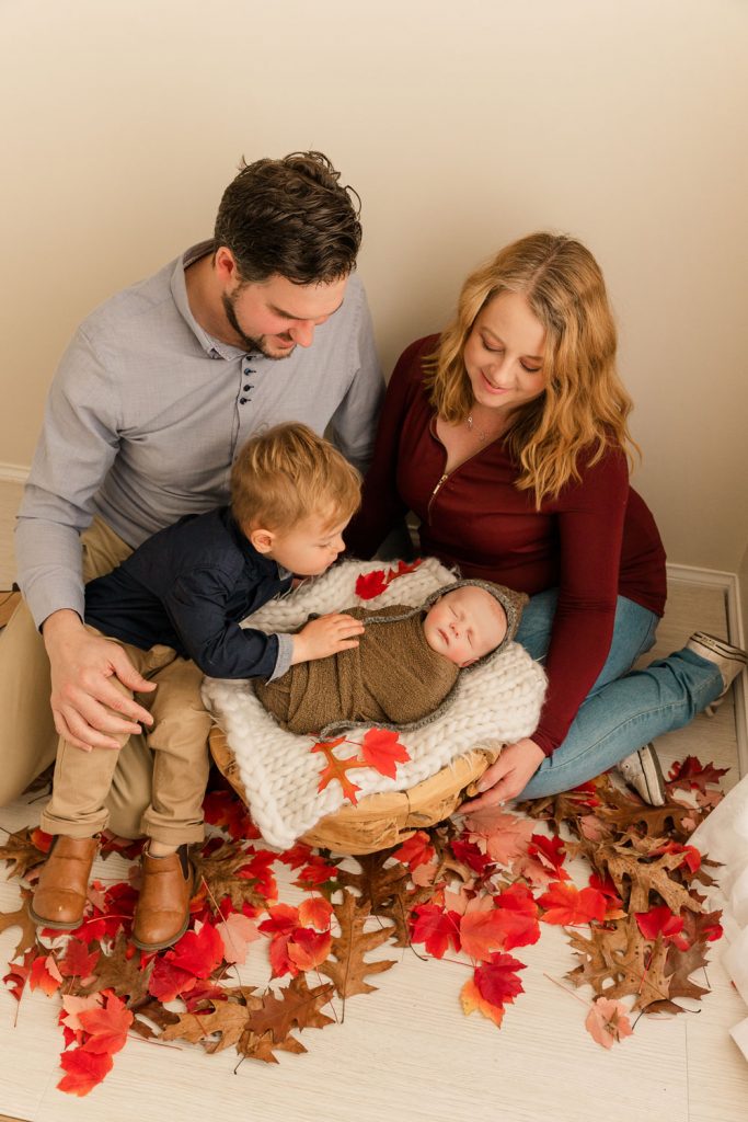 Newborn family in autumn tones